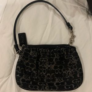 Coach wristlet 6”x4 “ Used Good Condition Some discoloration around inner zipper